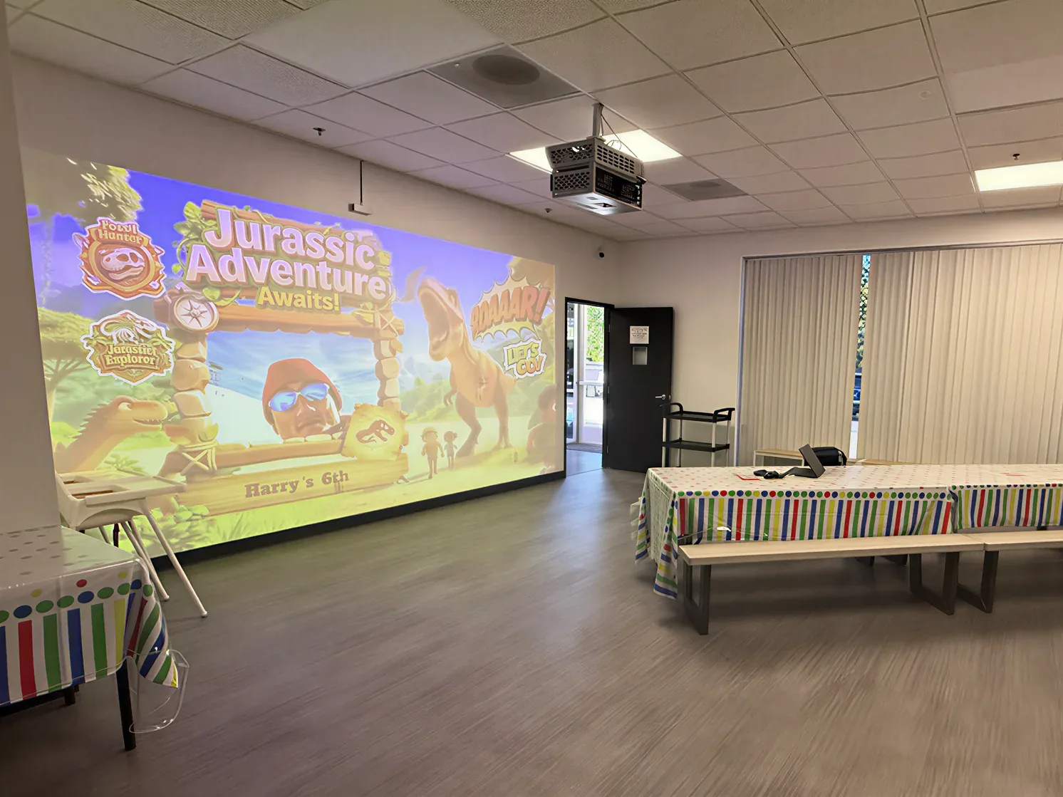 PartyDrax personalized birthday projection experience in a kids cafe party room
