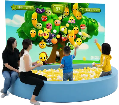 Children playing in a Magic Ball pit beside a colorful interactive game screen