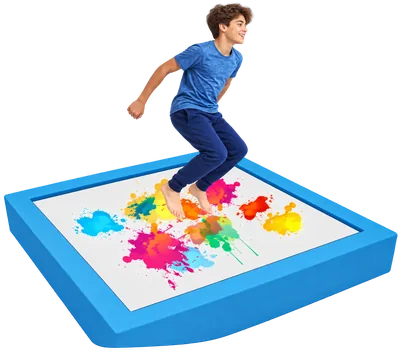 Child jumping on a Magic Trampoline play surface with colorful floor effects